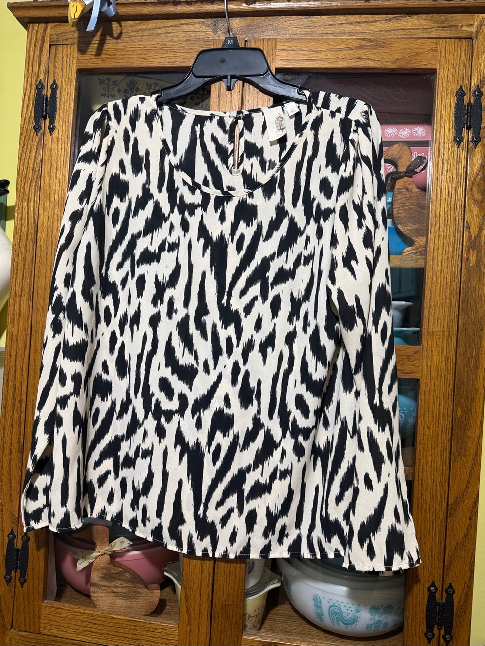 Francesca's Collections Black and cream/ivory Animal Print Blouse